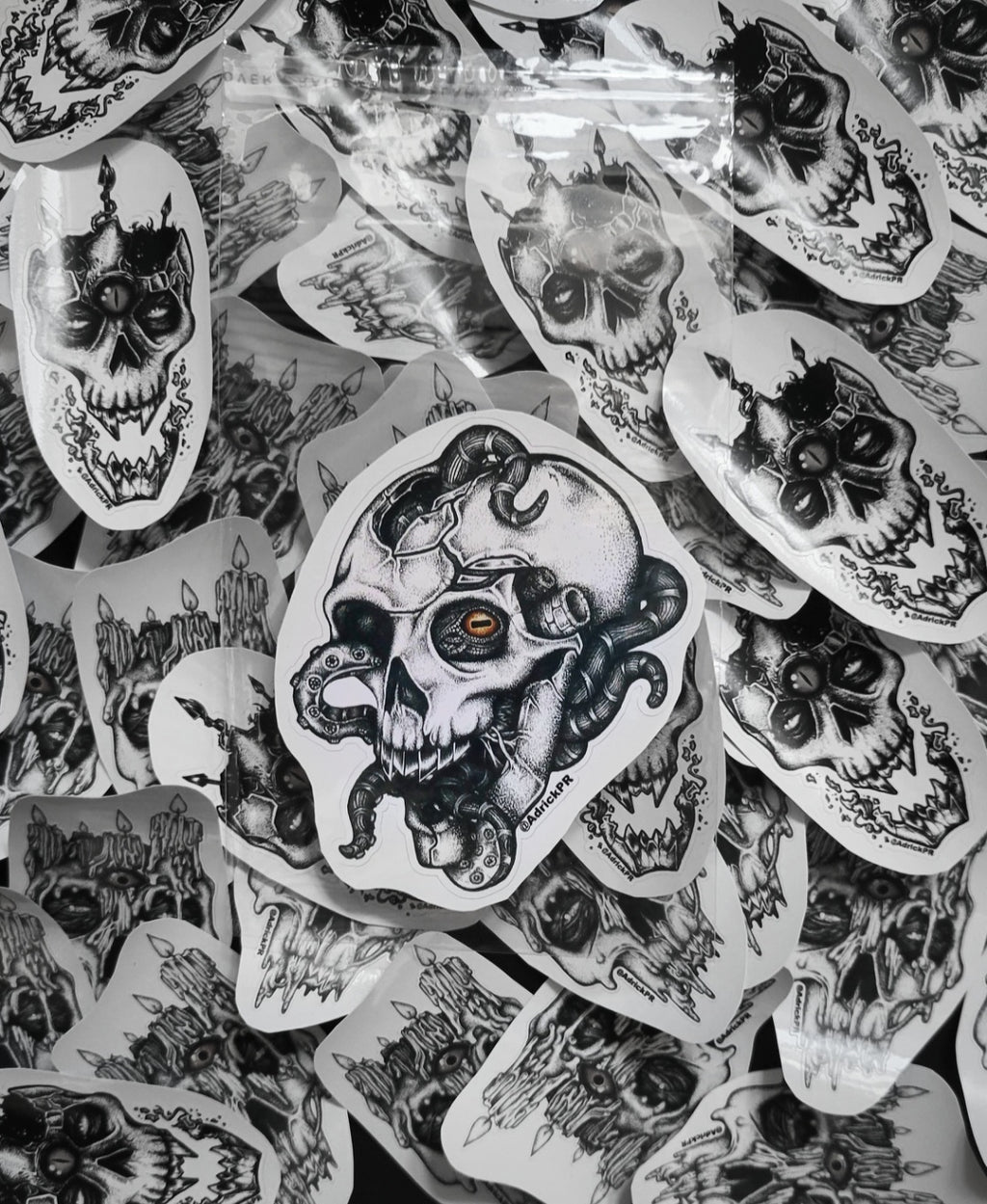 Art Collection of skull-themed stickers on a clear plastic sheet. 