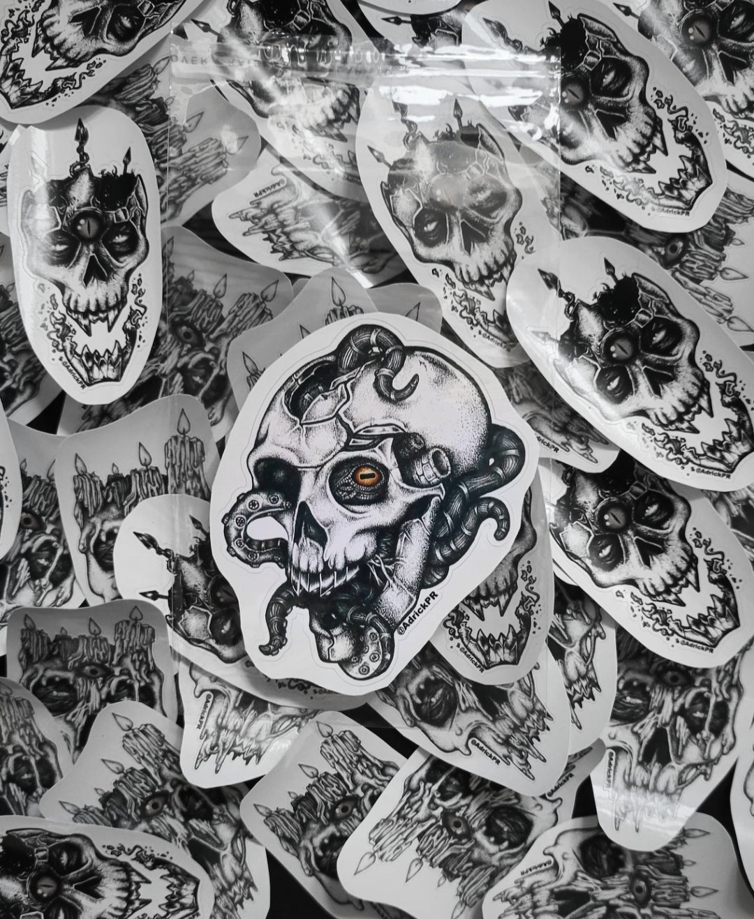 Art Collection of skull-themed stickers on a clear plastic sheet. 